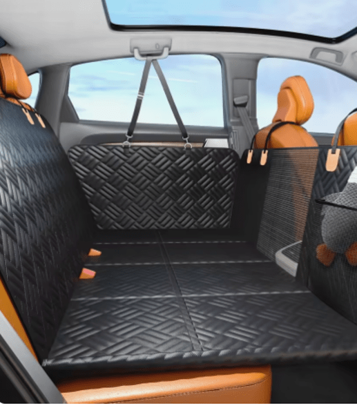 Quilted back-seat pet cover and extender installed in a vehicle for safe pet travel